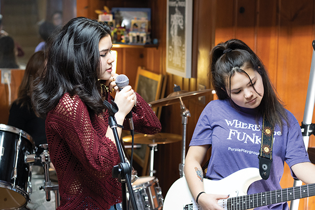 Edina residents Natalie (L) and Olivia Tran (R) attended the Academy of Prince music camp and have since continued making music with other teens who attended the program.