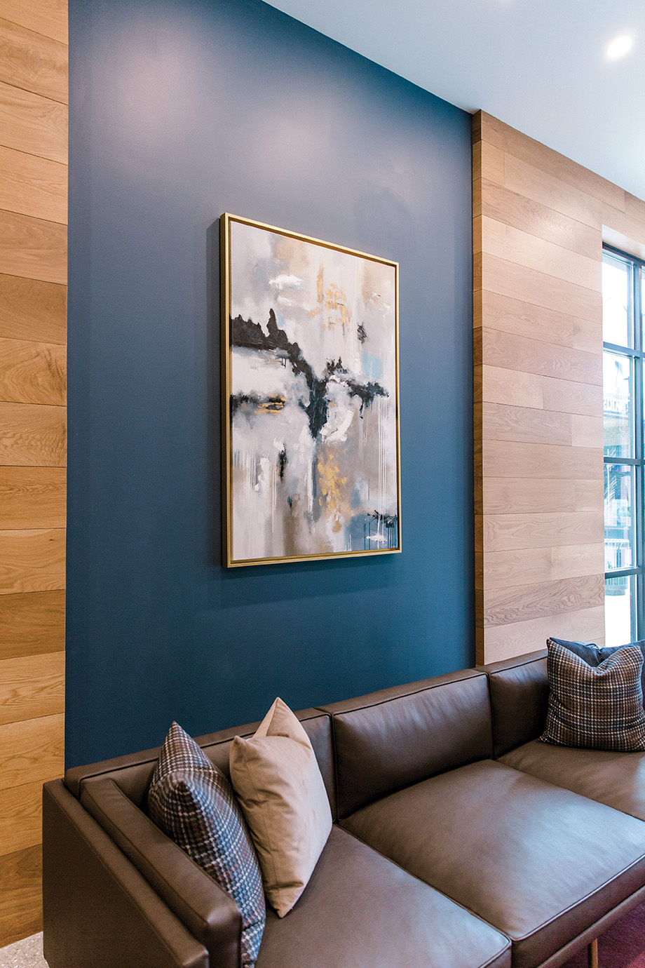 One of Johnson's abstract paintings hangs in the lobby at Nolan Mains.