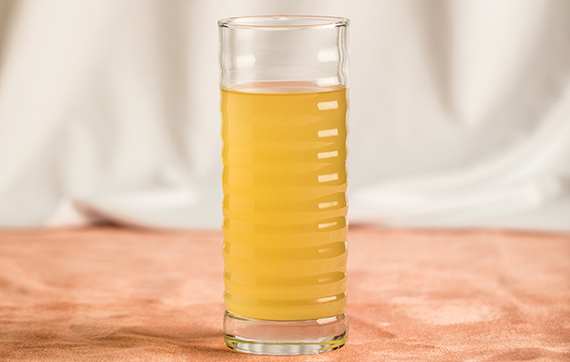 Chicken broth in a glass