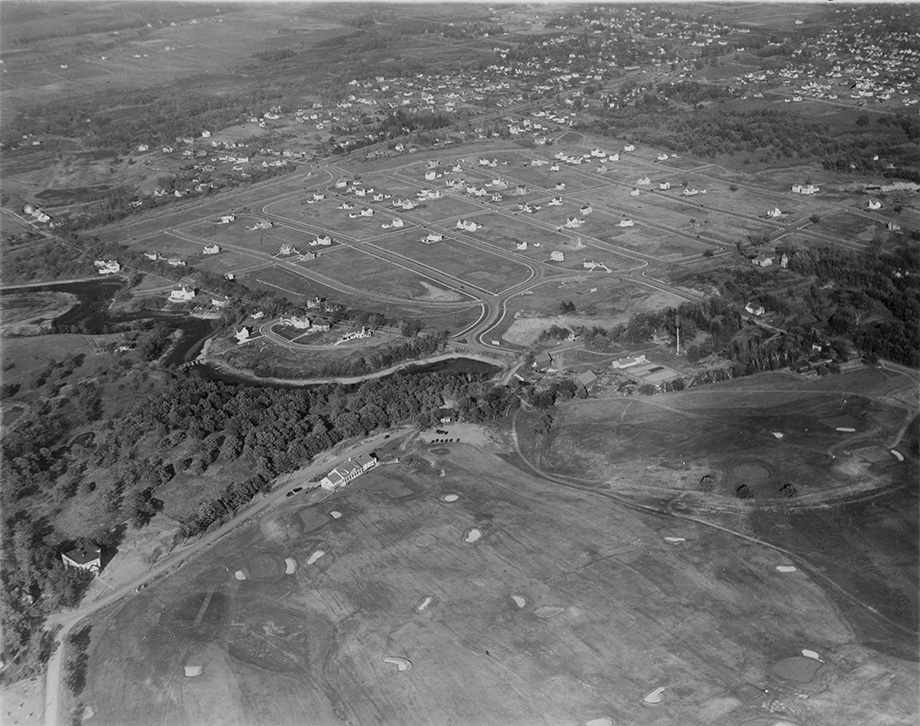  Edina in 1925. This is a northeasterly view and features Edina Country Club golf course, Country Club neighborhood and the Minnehaha Creek and mill pond running through the middle of the photo. 