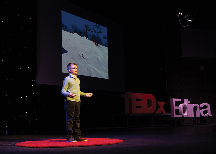 Erik Brovold on stage at TEDxYouth@Edina.