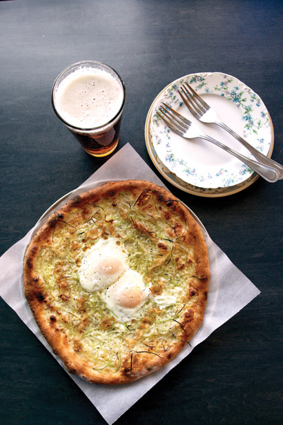 Pizzeria Lola's The Sunnyside pizza is rich and creamy-- and lets customers dip their crust in egg yolk.