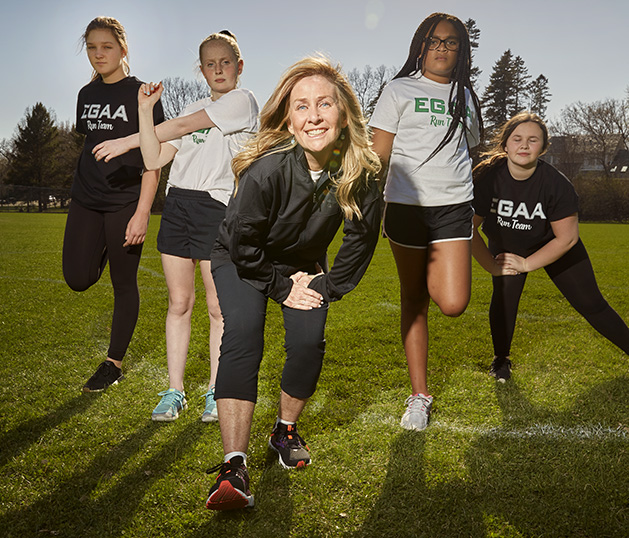Tanya Dowda and members of the Edina Girls Athletic Association run team.