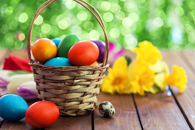 An Easter basket filled with colorful eggs