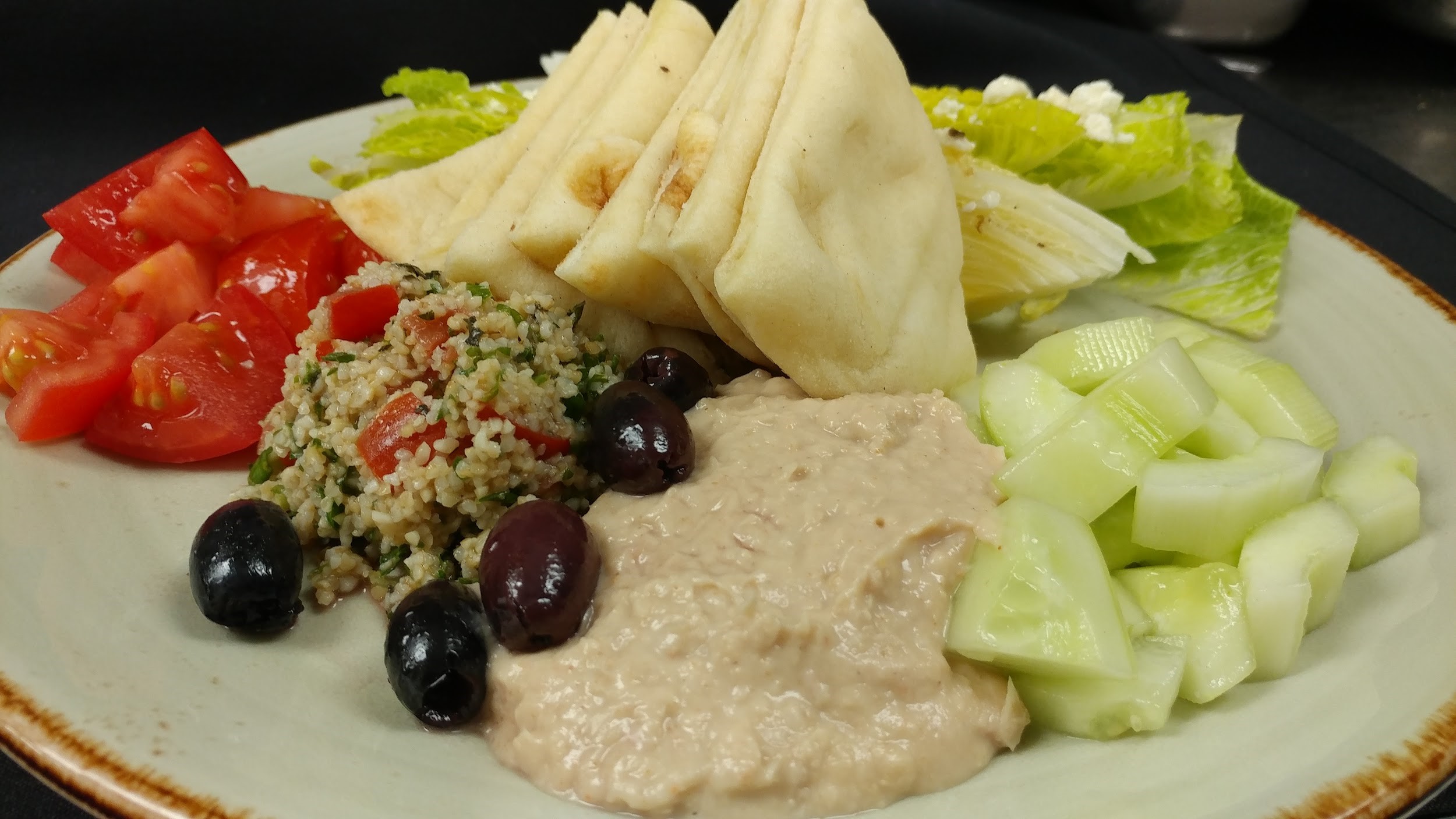 Greek salad, featuring tabbouleh.