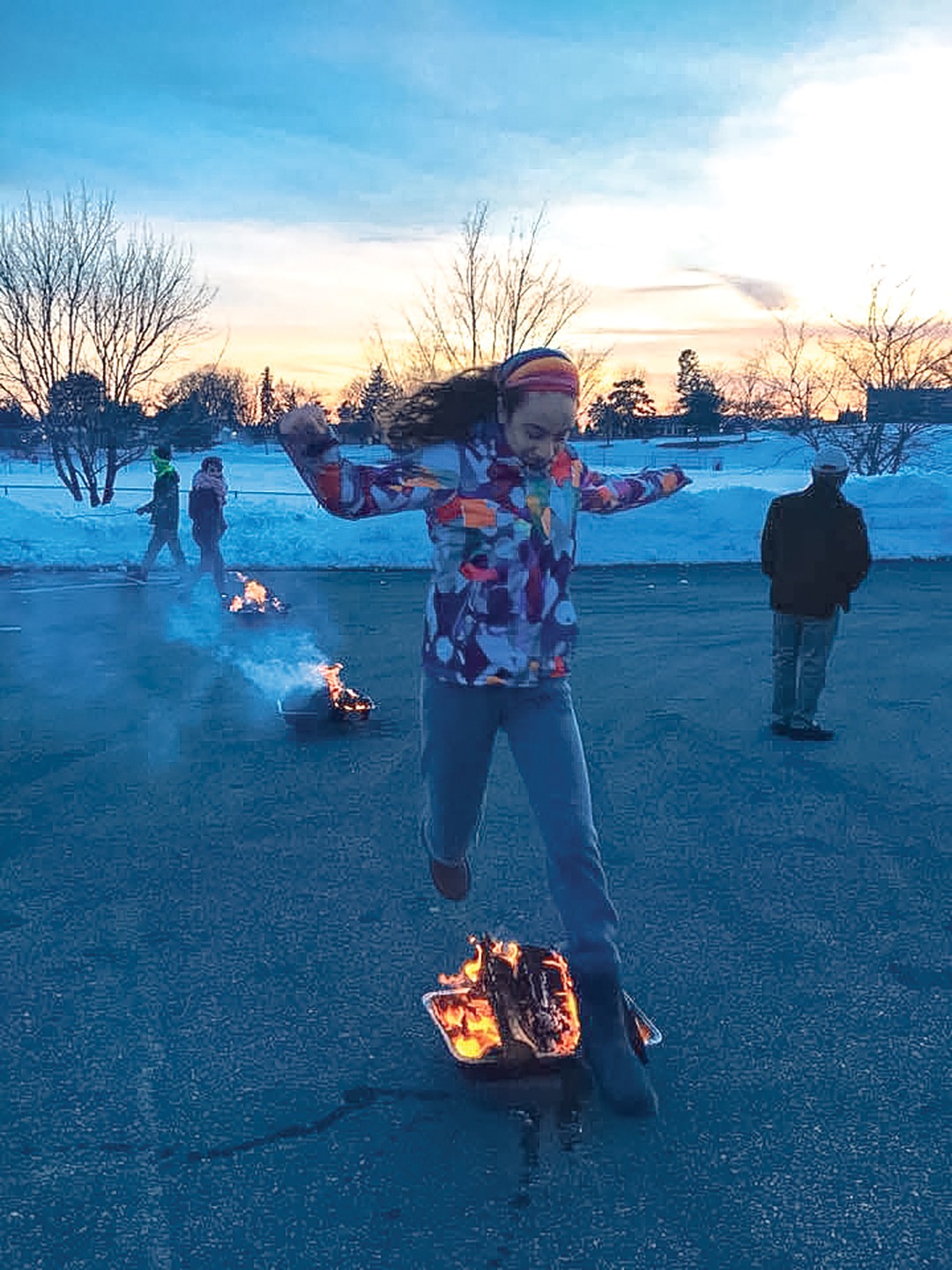 Community members jump over the fire at the first Chaharshanbeh Suri event in 2018. Photo: Ghazaleh Dadres