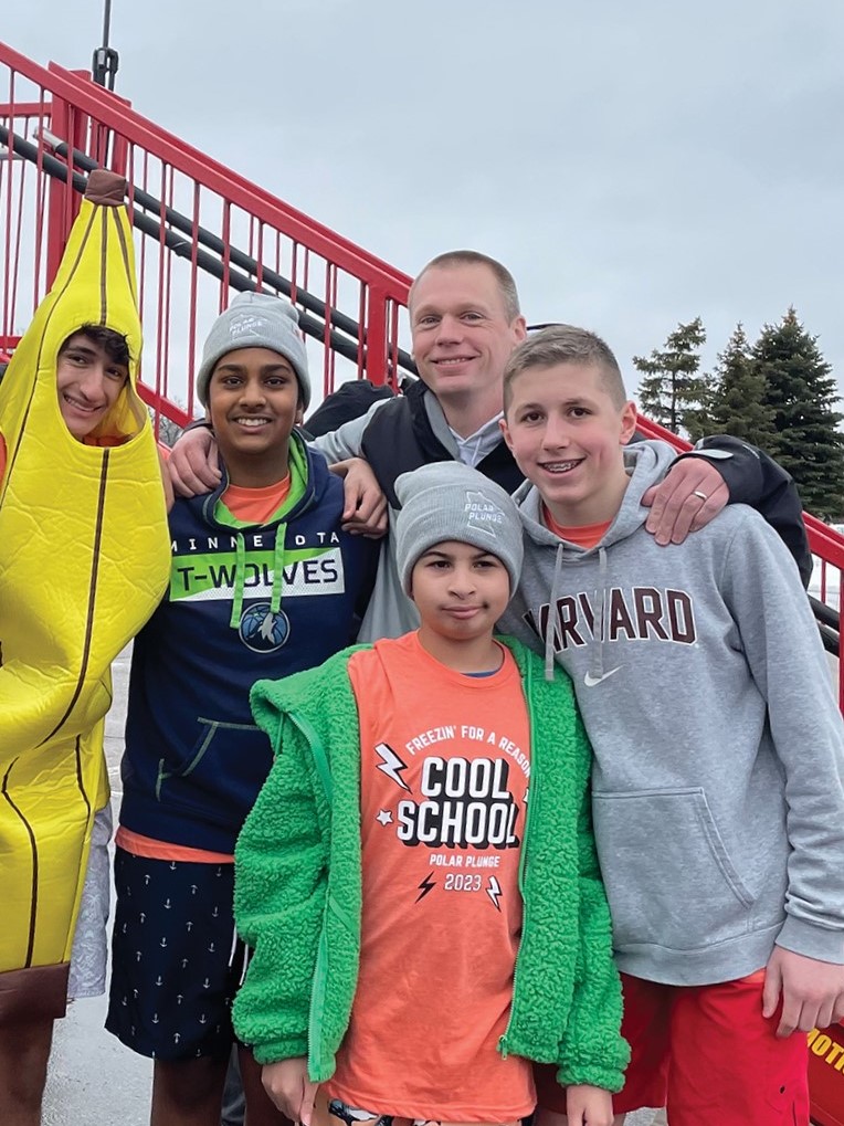  VVMS at the 2023 Polar Plunge held annually at SVMS. Left to right: Rishi Shah, Varin Sinha, paraprofessional Daniel Mauer, Aidan Mehta and Alex Allocco.