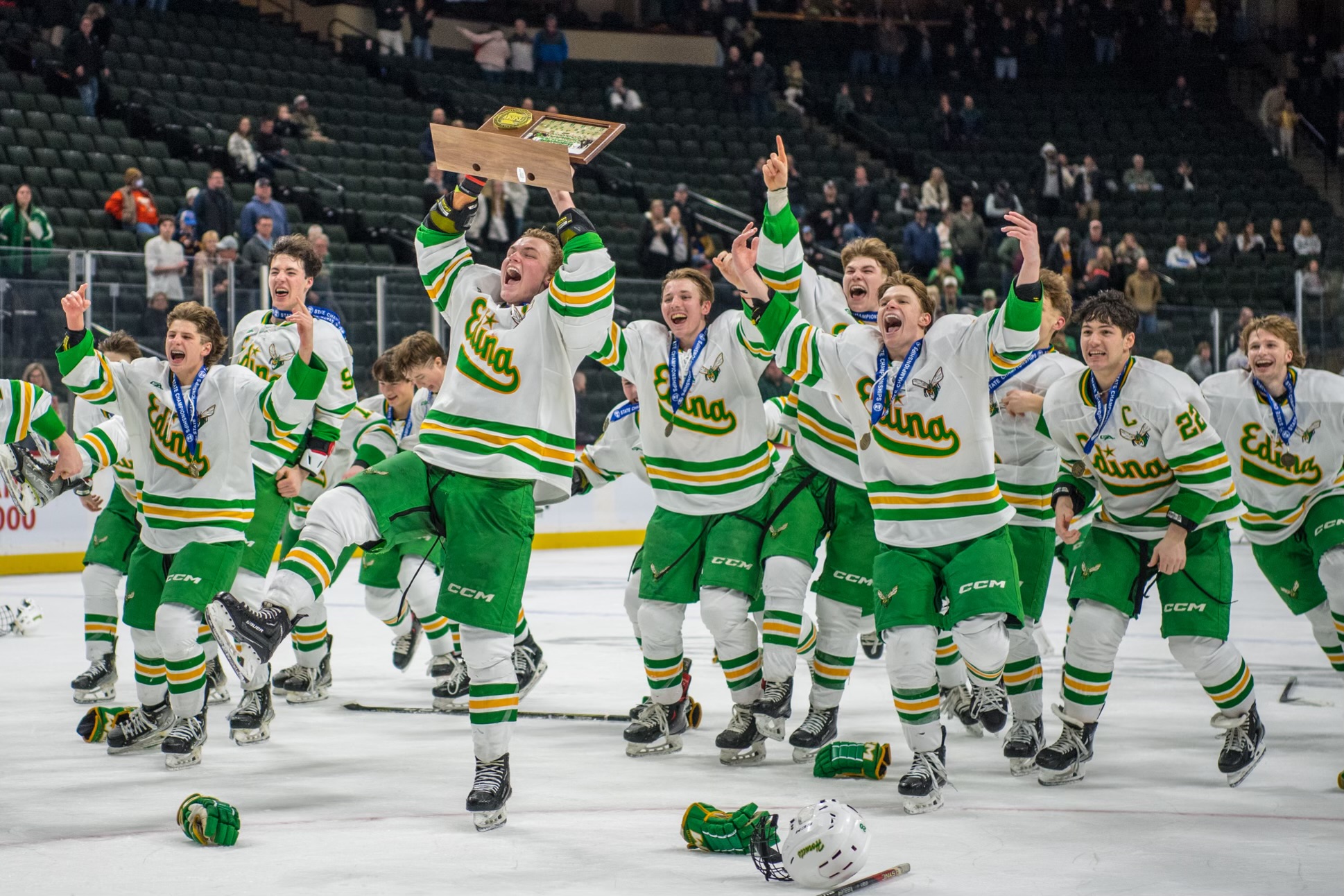 The Edina Hornets boys' team celebrates its win at the 2024 Boy’s State Championship game.