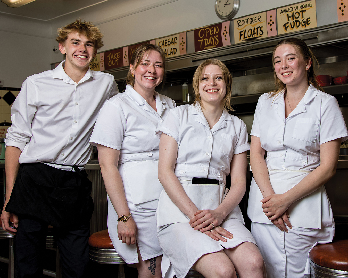 Staff members in their white uniforms.