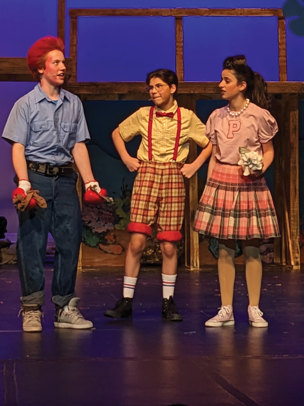 John Schenk as Mr. Krabbs, Danyal Choudhry as SpongeBob and Julia Farah as Pearl in The SpongeBob Musical: Youth Edition at the Edina Performing Arts Center.