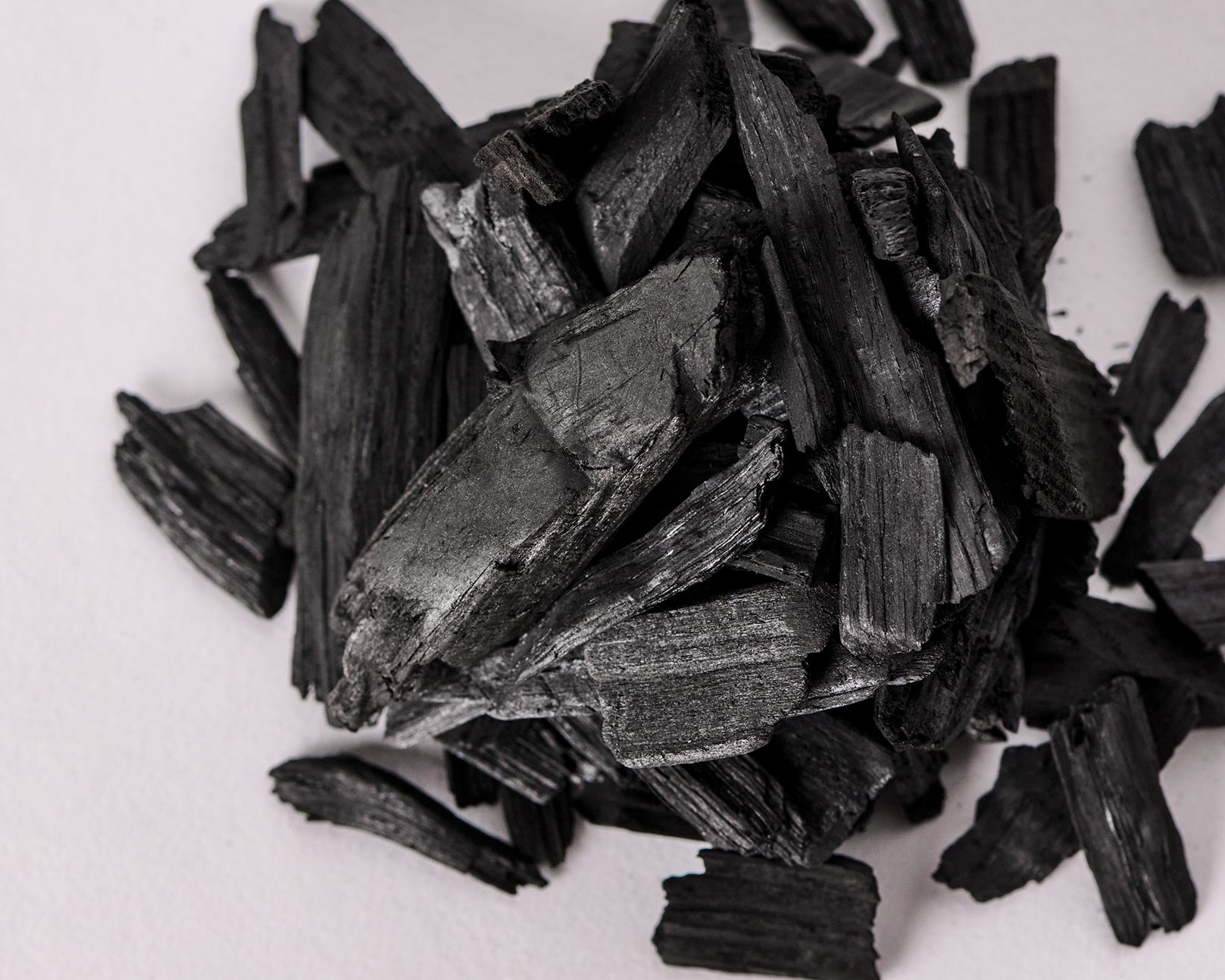 Solid carbon, or carbon charcoal, created by Carba, a company that takes carbon emissions from the air and turns them into a coal-like substance, which is then buried underground. Call it reverse mining.