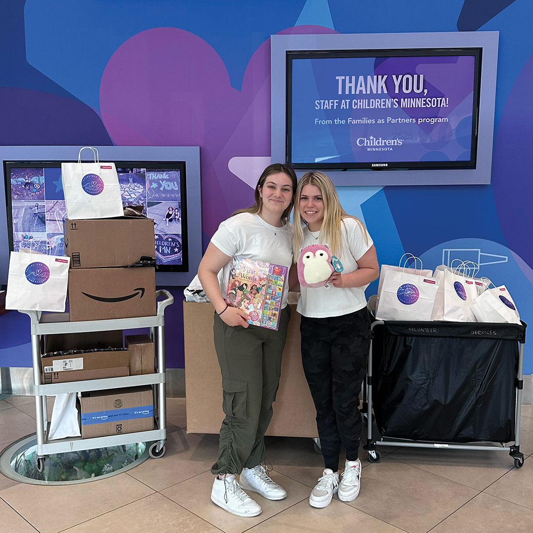 Left to right: Benilde-St. Margaret’s students Annika Olson and Katie Berthoud drop off care packages full of art supplies, stuffed animals and needed items to Children’s Minnesota Hospital-Minneapolis.