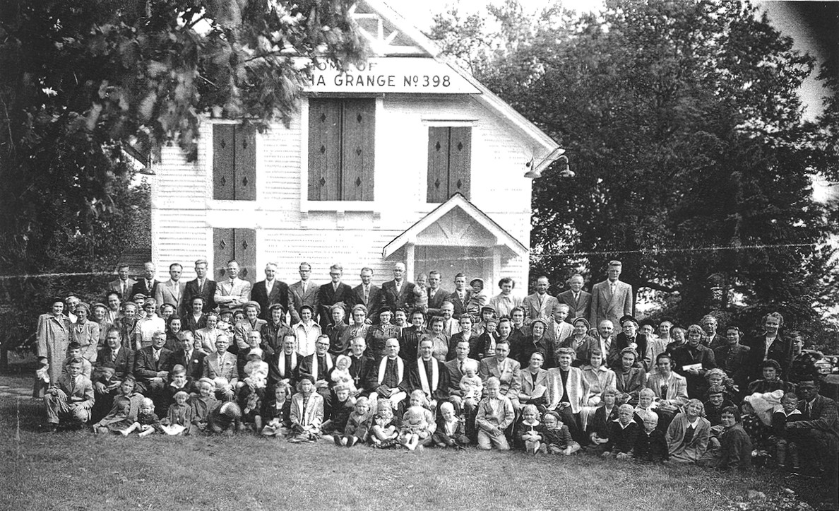 The congregation gathers outside its temporary home at Grange Hall on September 24, 1950.