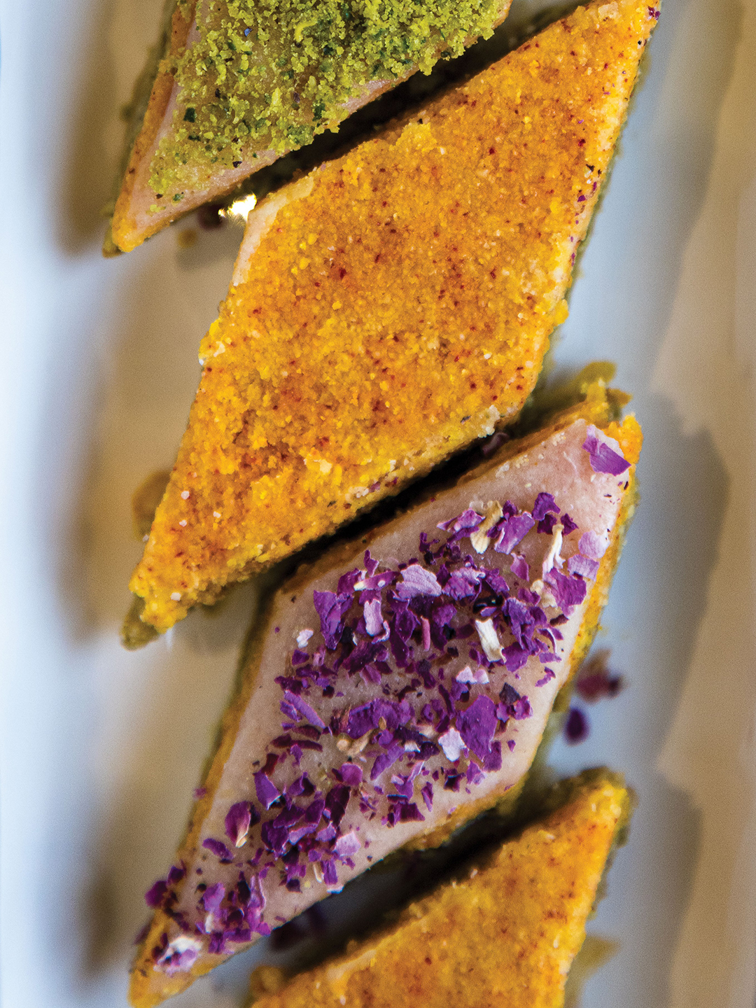 Persian gold baklava is layered with pistachio, almond and saffron. 