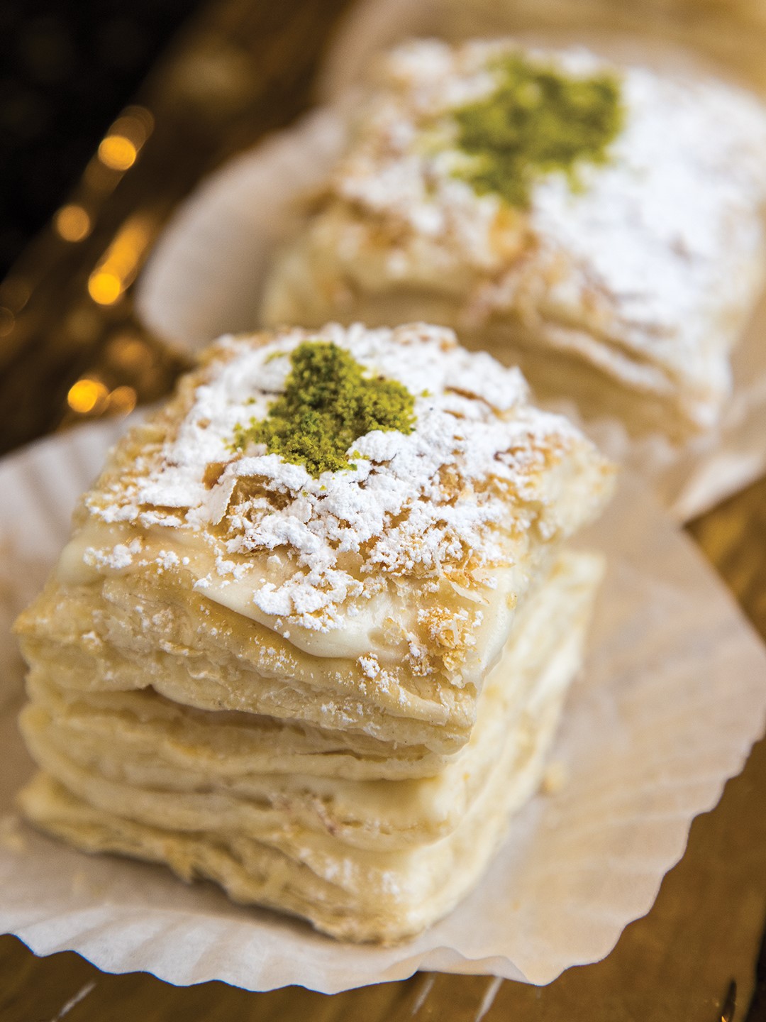 Napoleon cake is a traditional French dessert also known as mille-feuille. The Persian name for it is Shirini Napoleoni or Napeloni.
