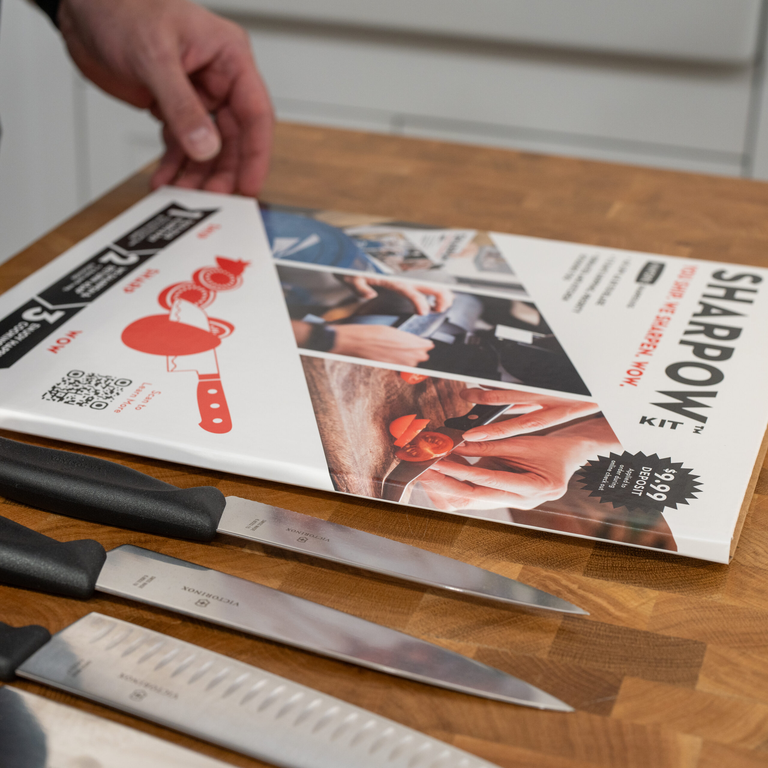 Sharpow Kit Packaging Next to Knives