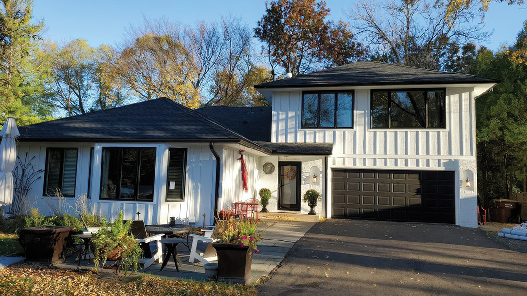 The renovated exterior of this home features Brava’s asphalt-style shingles, offering a similar look to asphalt, but with updated materials. 