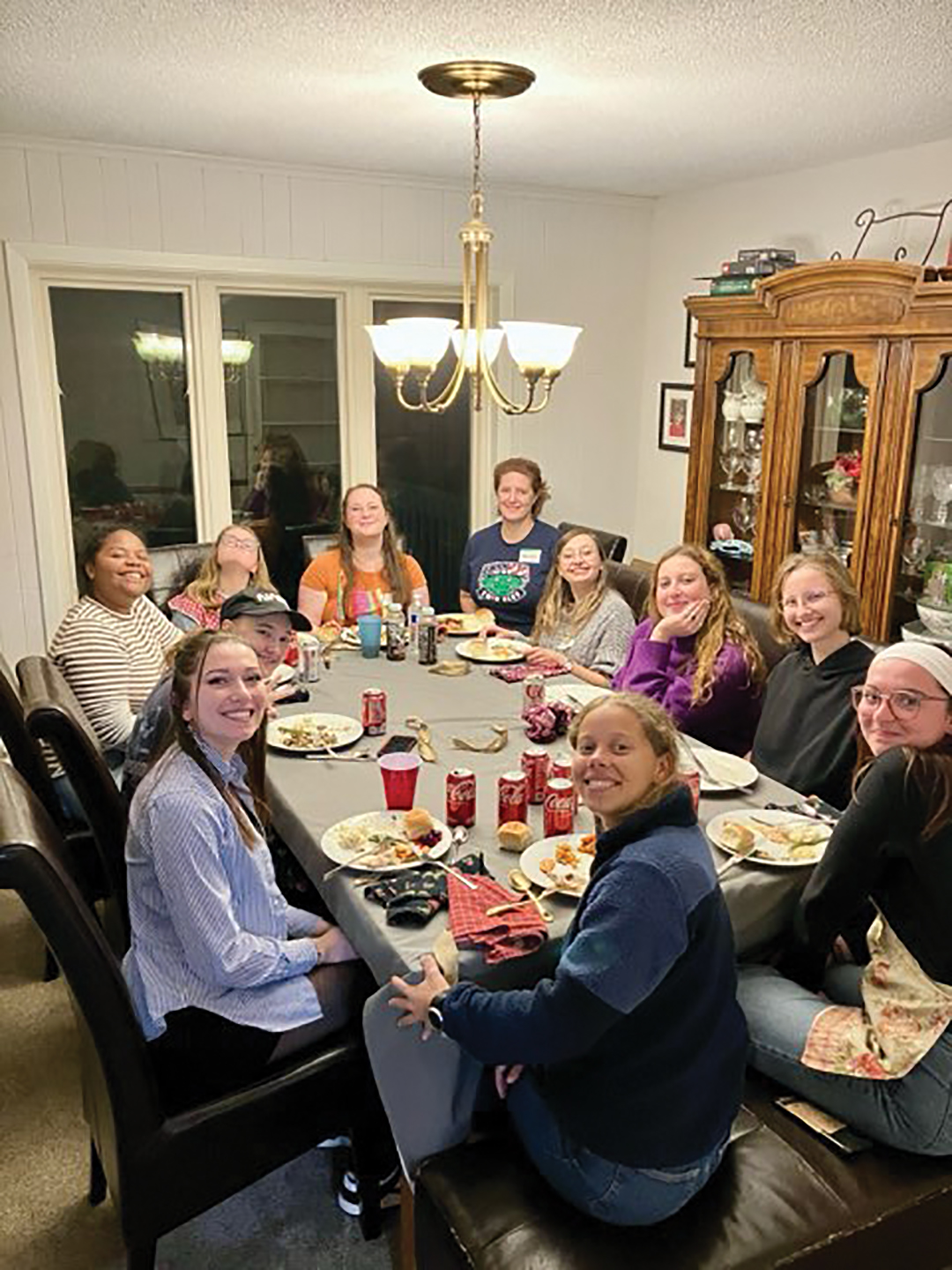 Group of French intern teachers at Thanksgiving table