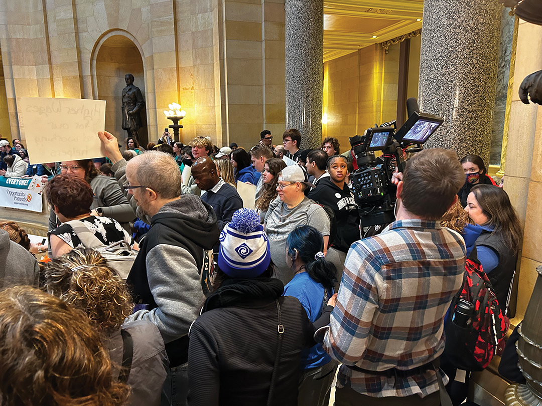 Brennan Vance filming during Disability Services Day at the Minnesota State Capitol. 