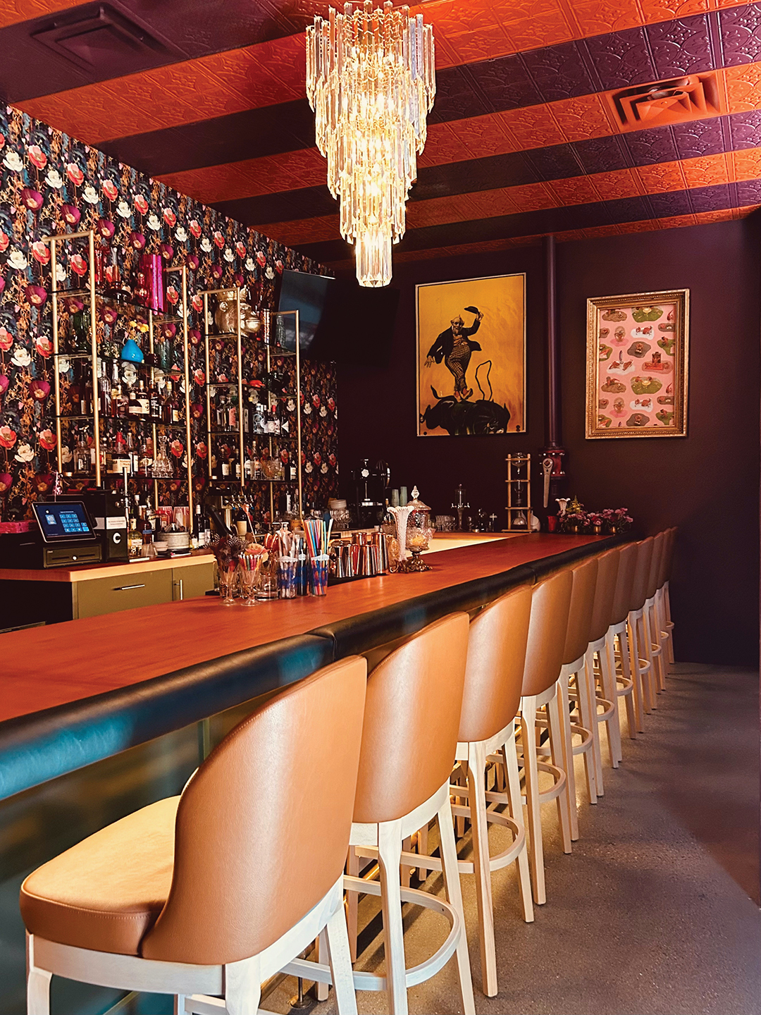 Carnival Bar dazzles guests with its lively circus-inspired interior and inventive cocktails.