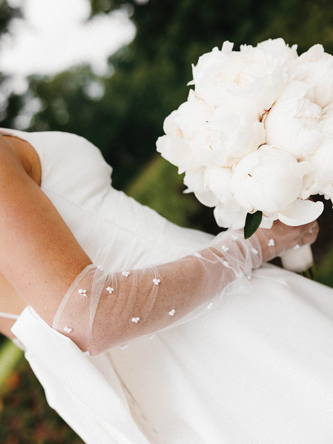 Grace Dahm’s wedding dress closeup