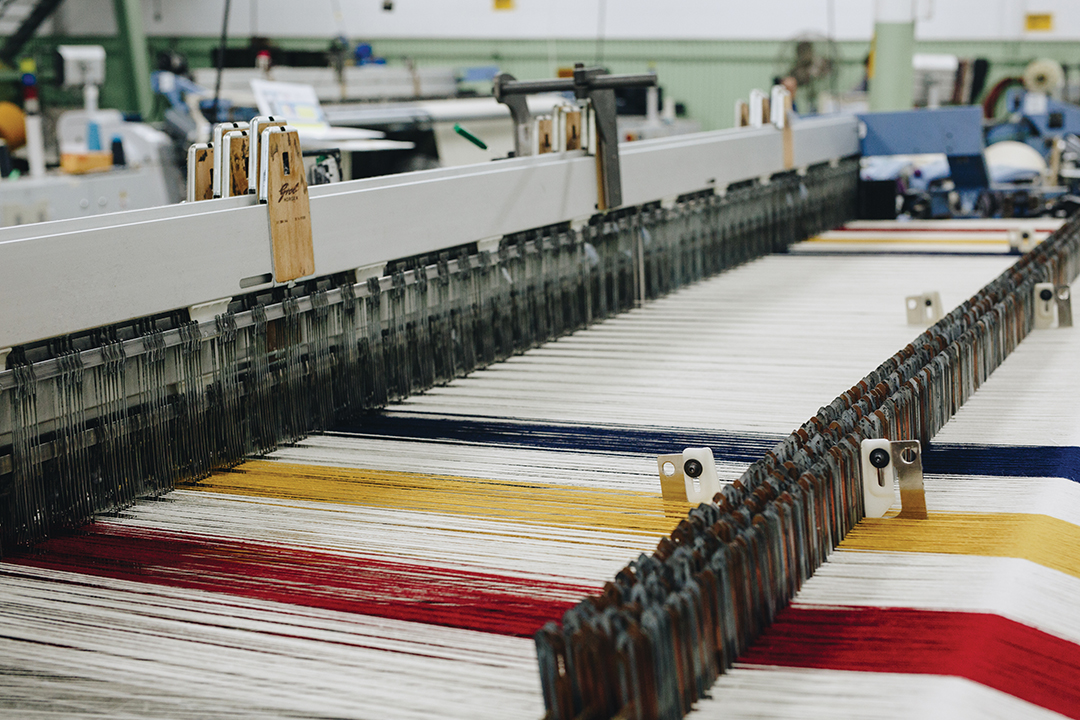 Modern looms weave the Frontier Wool Blanket.