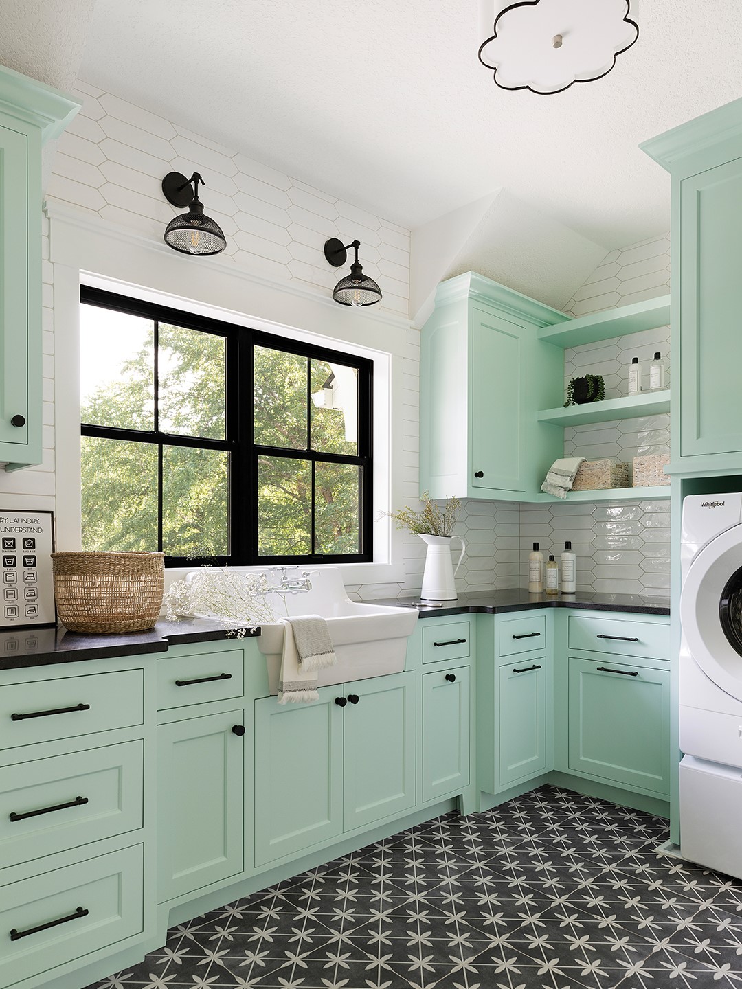 Designer Bhavana Bhimavarapu says the connection to water is seen in almost every room of the lake home. “The fun color in the laundry room, the warm wood touches in the bathroom,” she says.
