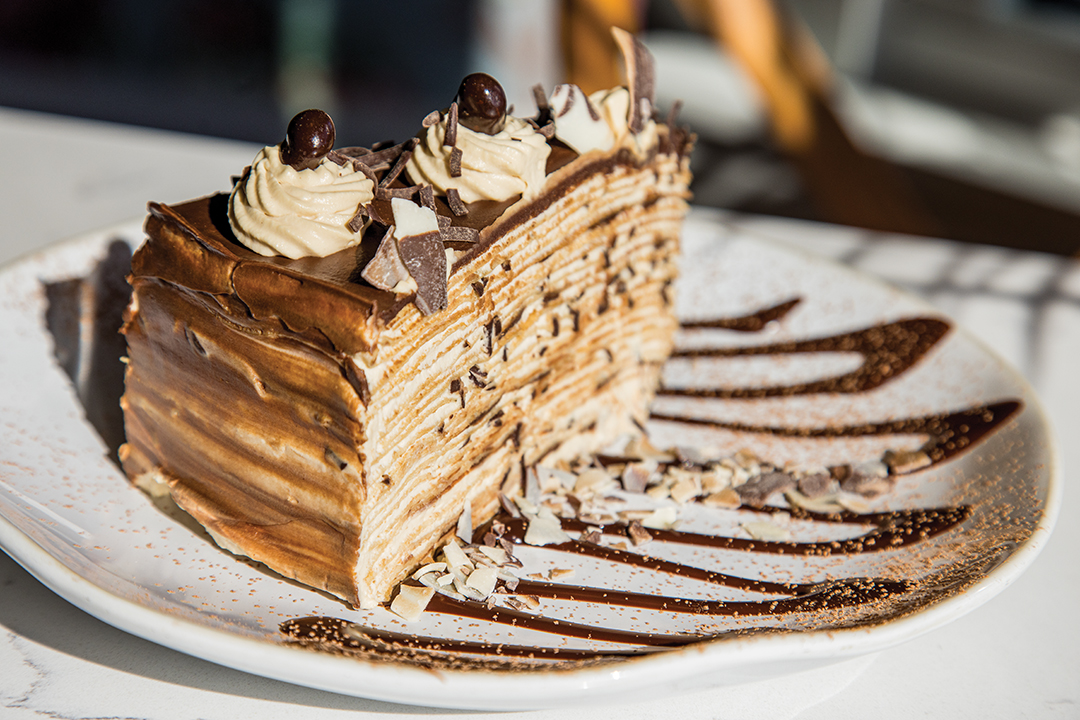 Oh Crêpe!’s Claire Corvaisier has a passion for exploring new flavor combinations. Pictured is her Tiramisu Crêpe Cake.
