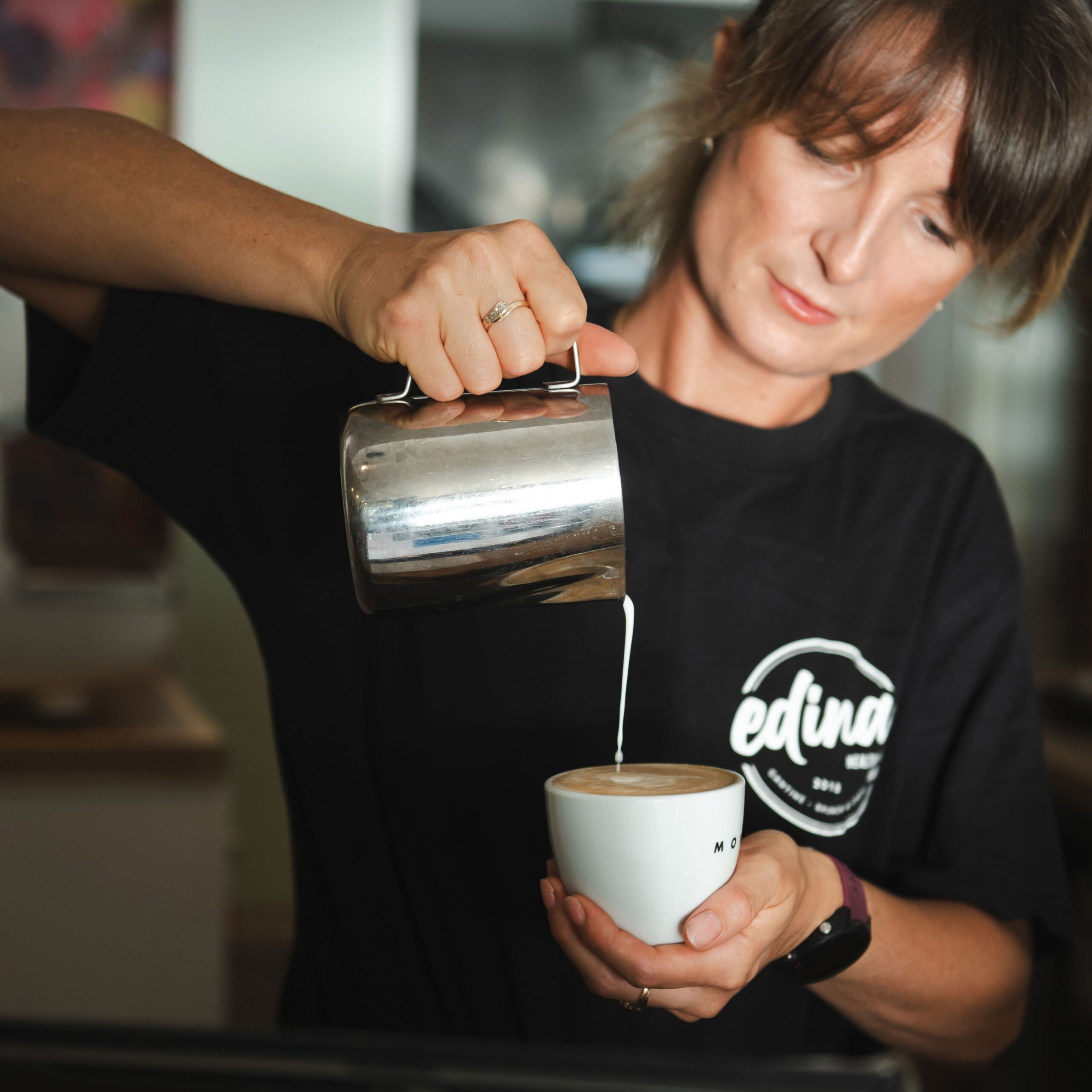 Kinga Chambriard crafts a latte with care and precision.