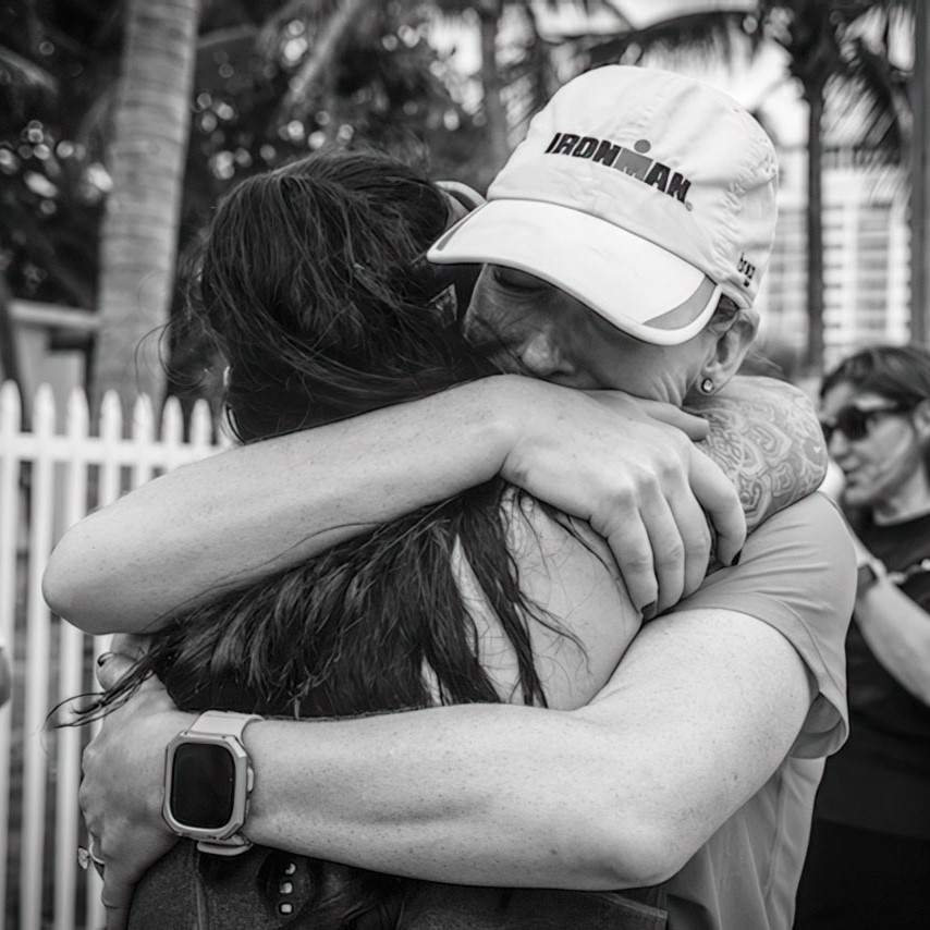 Smiles and hugs abound as Ellen Hunter Gans celebrates finishing the Great World Race. The final marathon was in Miami.