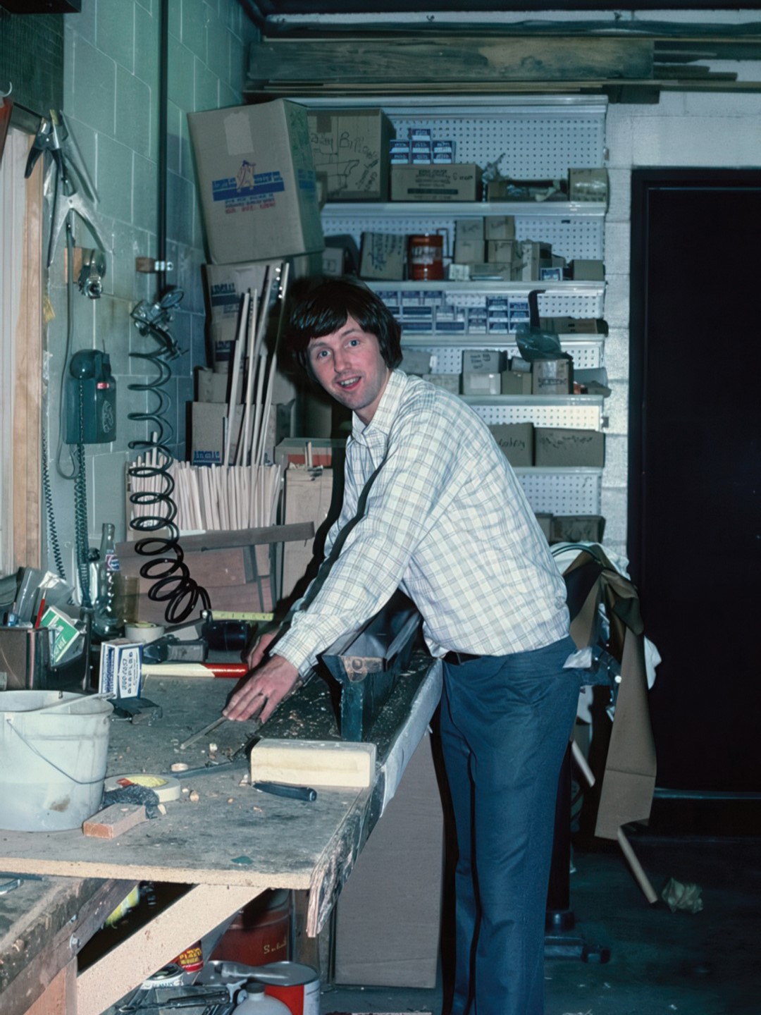 Greg Peterson in his workshop in 1976.