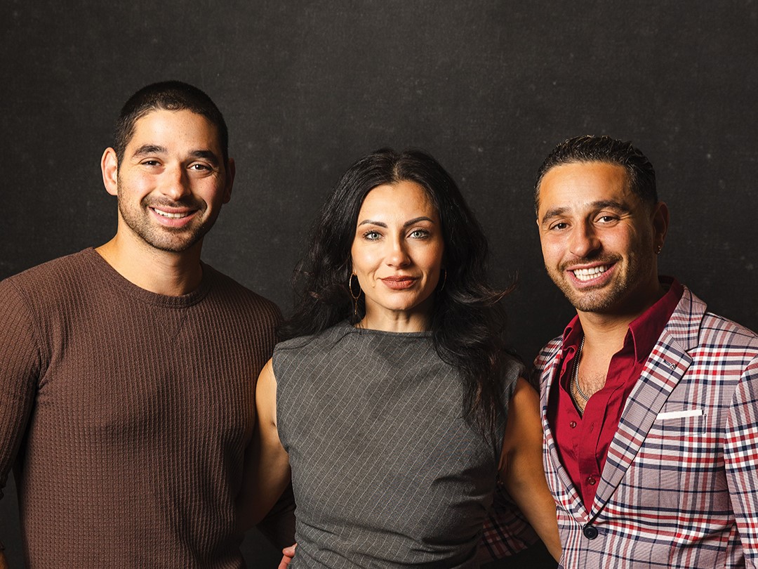The family that dances together stays together. Alan Bersten and his sister-in-law and brother, Elena and Gene Bersten, share a quiet moment during downtime at Snow Ball, their annual international ballroom dancing competition in Minneapolis.