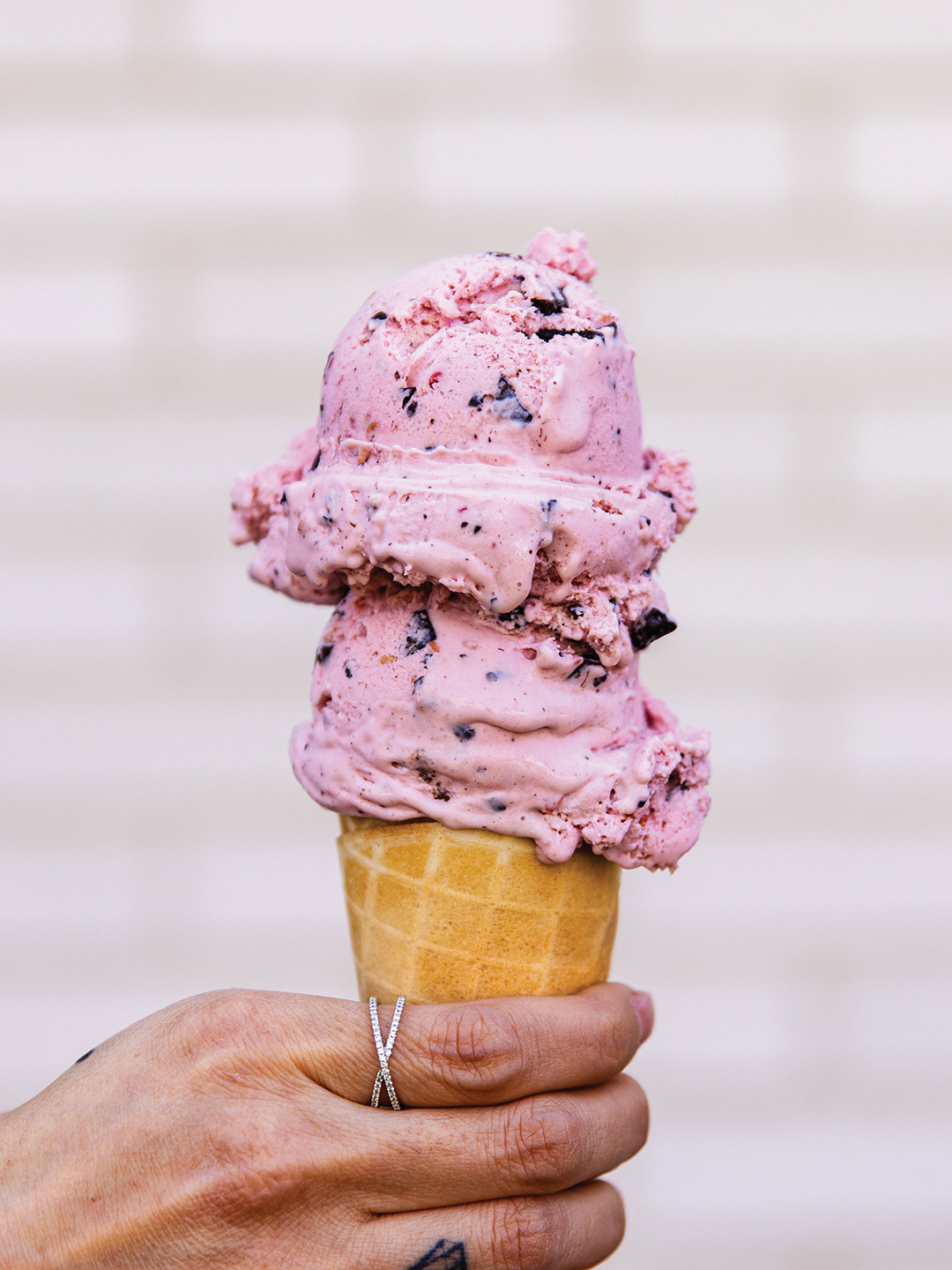 Sebastian Joe’s serves up Raspberry Chocolate Chip ice cream in a sugar cone.