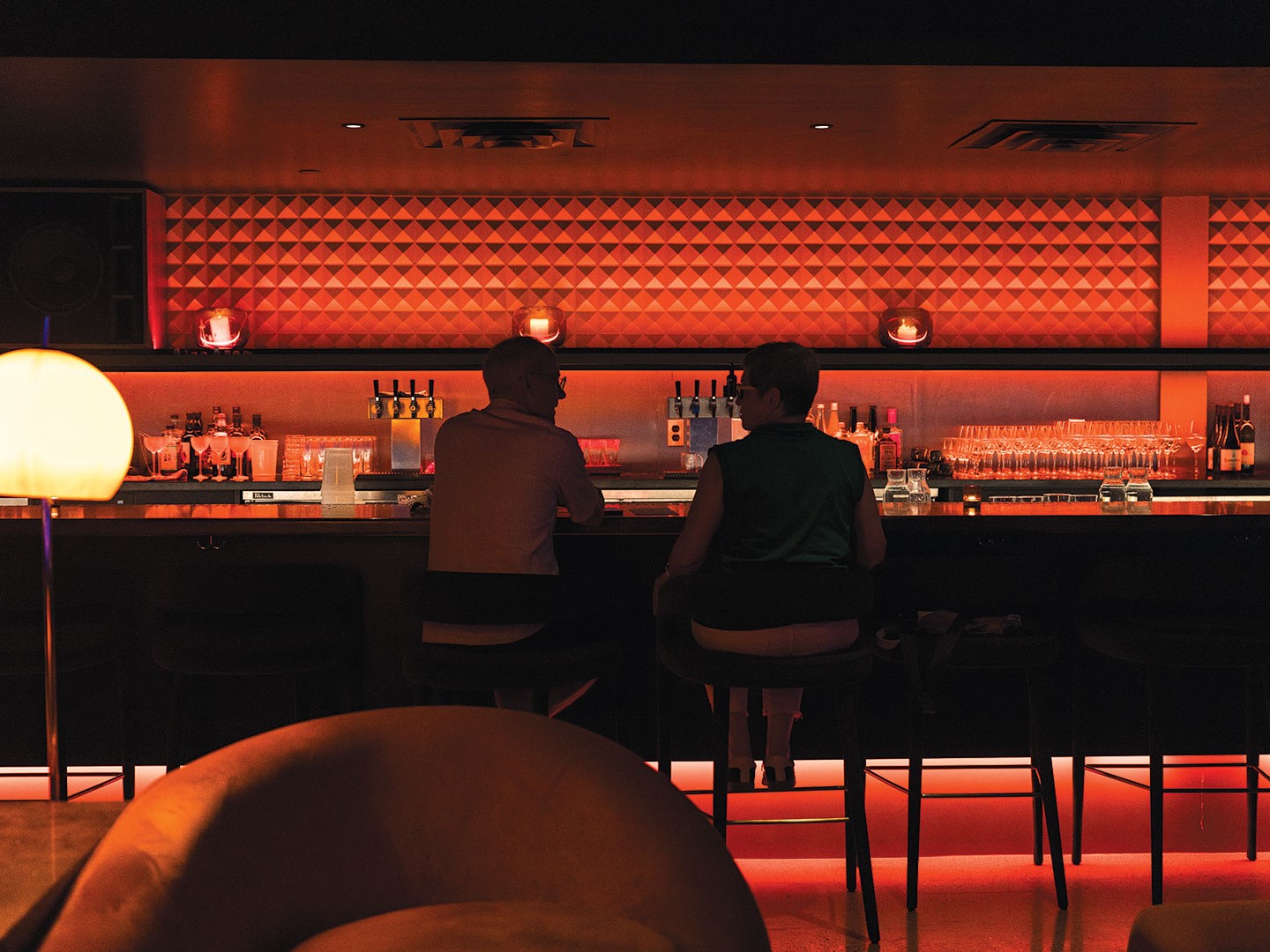 Guests unwind at noma hi-fi, where expertly crafted cocktails and high-fidelity sound create an elevated listening and culinary experience.