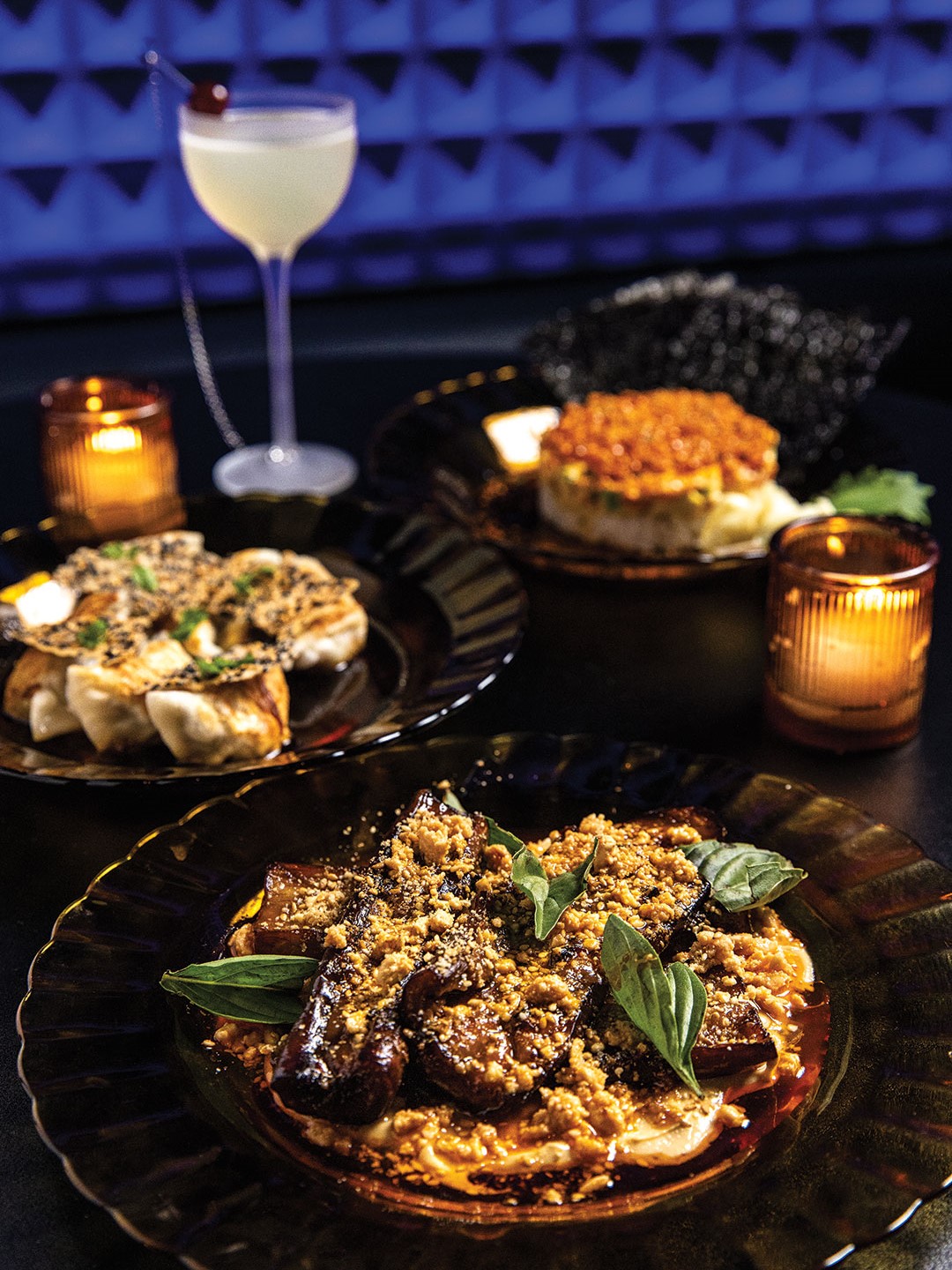 Miso Roasted Eggplant, Pork and Shrimp Gyoza, and Spicy Salmon Donburi are just a sampling of snack plates on the menu.