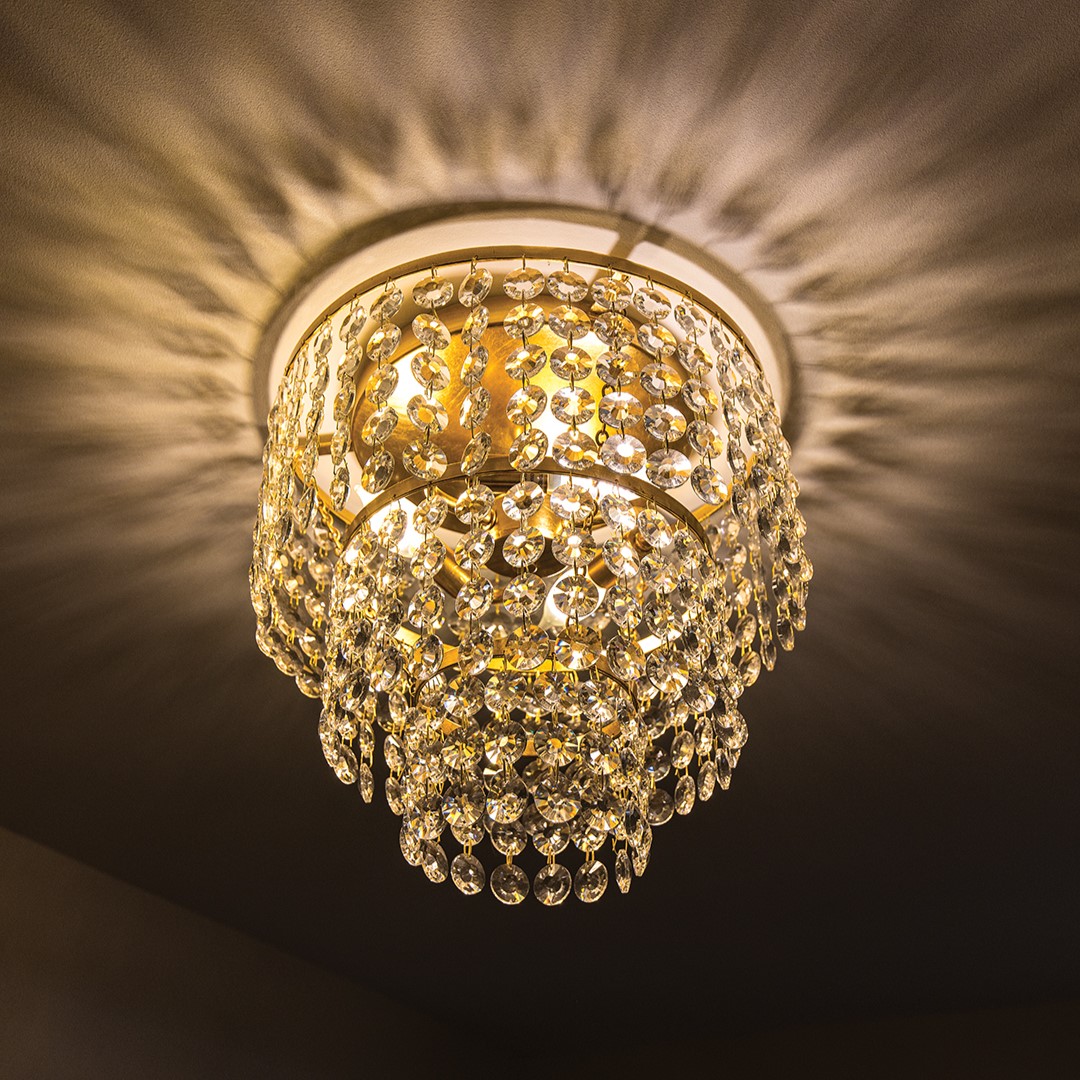 Replicas of vintage chandeliers and other fixtures were added. When Renée May gave her friends a tour, one said, “Oh, how nice you kept the original chandeliers.” May says she knew it was a remodel well done when she heard that.