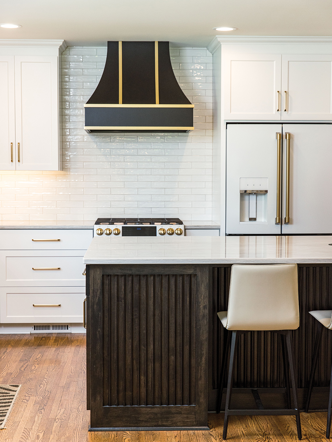 The Mays, along with Rebecca Ryan Design, decided to remove walls and create a great room to make a larger kitchen. 