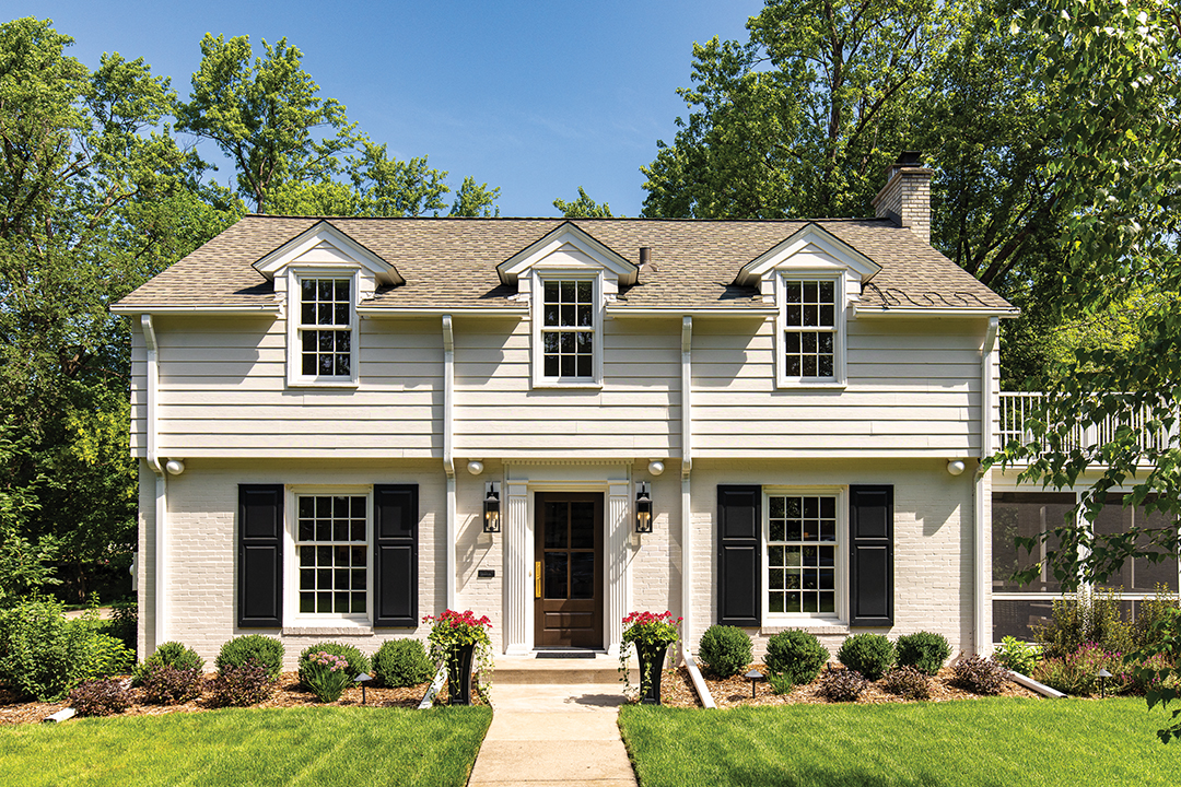 The exterior of the home benefited from a major facelift, including fresh paint, new shutters and updated lighting as well as a new door.