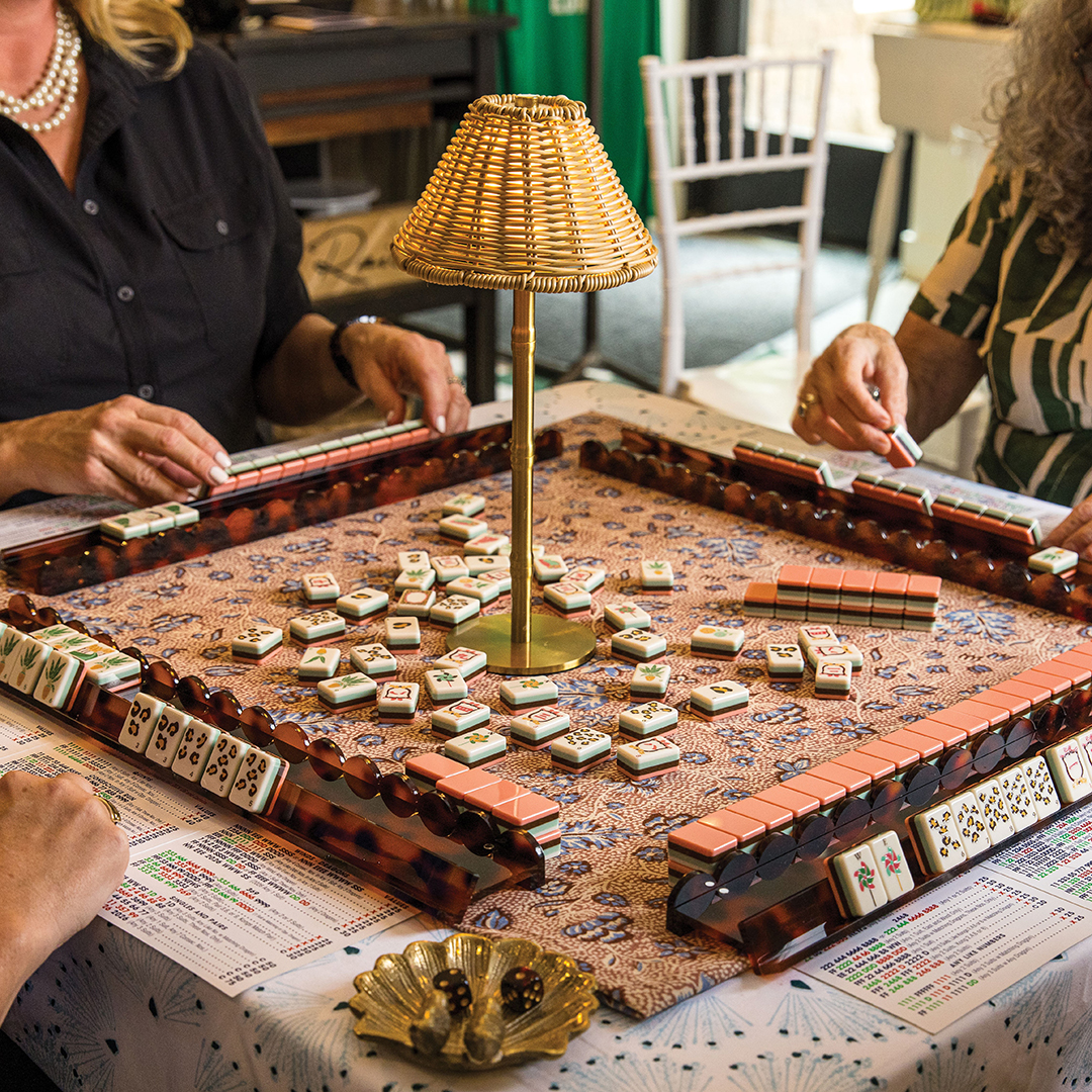 Four women playing mah jong